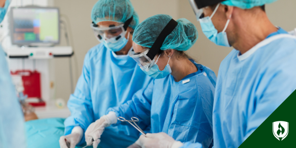 A surgical tech works with the surgical team during her clinical rotations