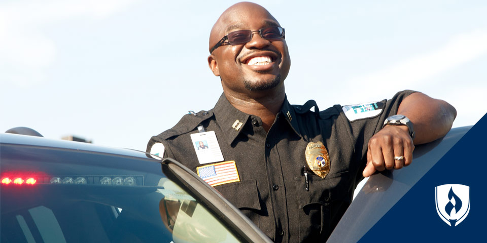 male police officer smiling