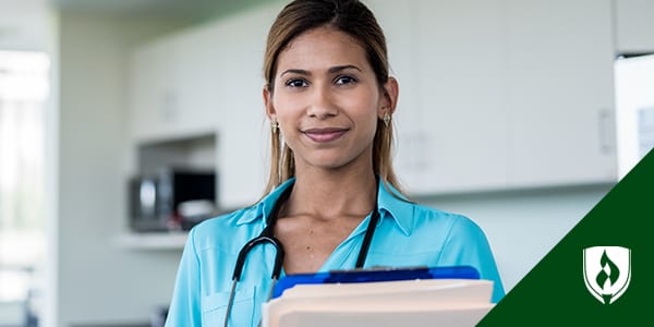 Photo of a nurse holding a clipboard.