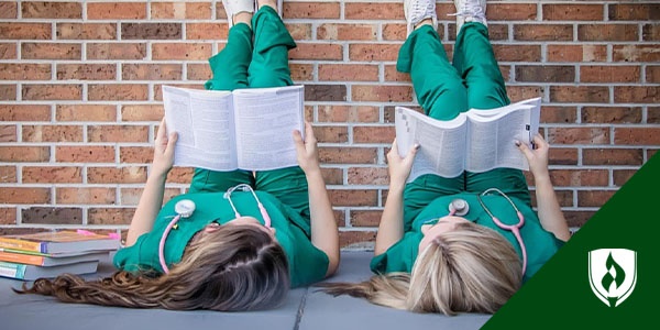 photo of nursing studying for bsn courses with their legs up a brick wall