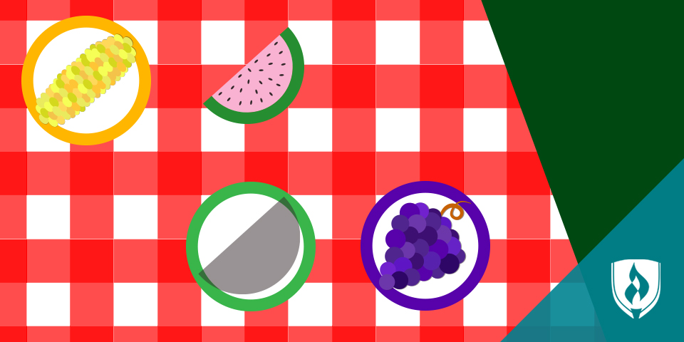 picnic blanket with food on top