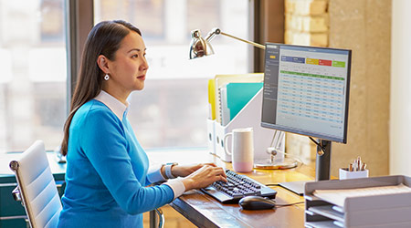 female accountant working on computer
