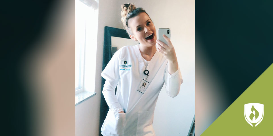 Megan Wohlman smiling in her Rasmussen scrubs.