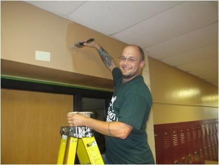 Volunteering painting and cleaning high school at Blaine campus