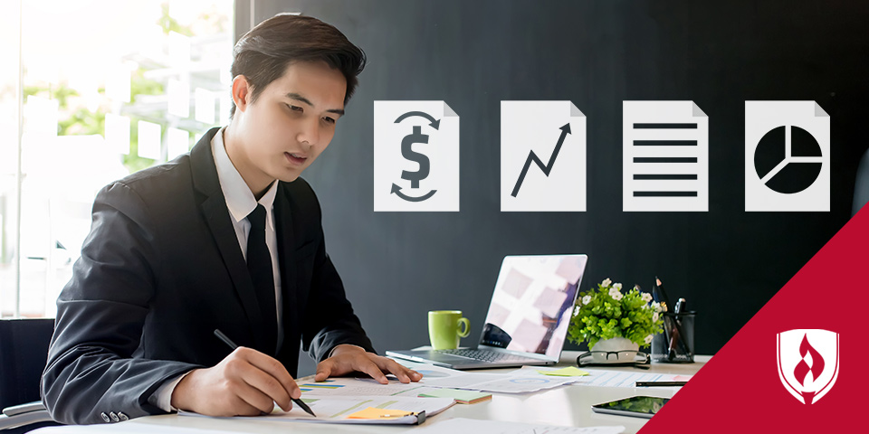man working at desk surrounded by finance icons
