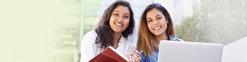 two female students studying