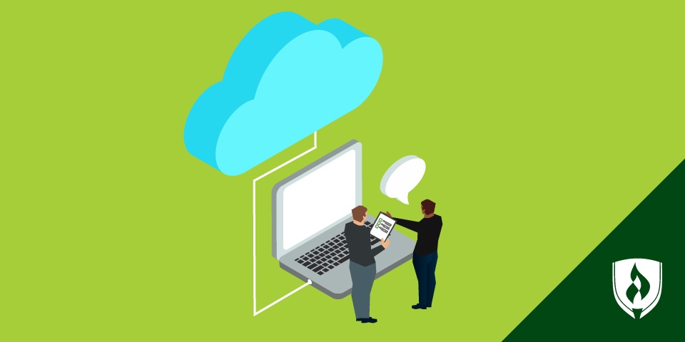 illustration of a laptop with a cloud above it and two information technology workers in front of it