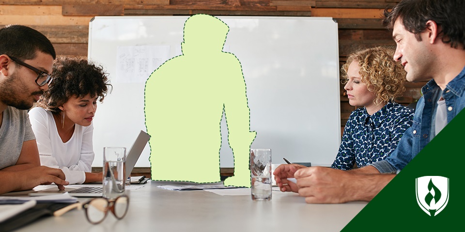 Photo of a cut-out person in a marketing meeting representing signs you should work in marketing