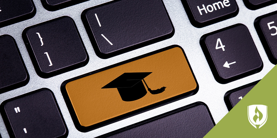 laptop keyboard with a graduation hat button