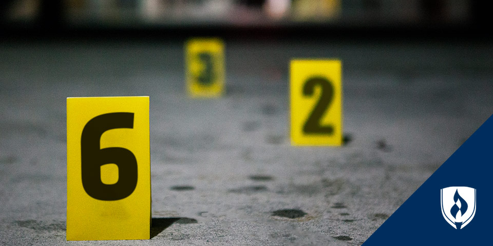 crime scene markers numbers on cement ground