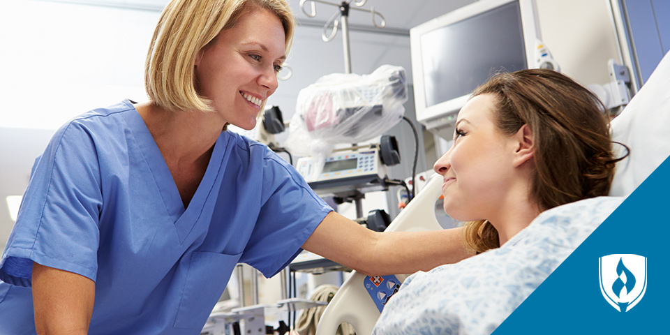 female nursing talking to female patient