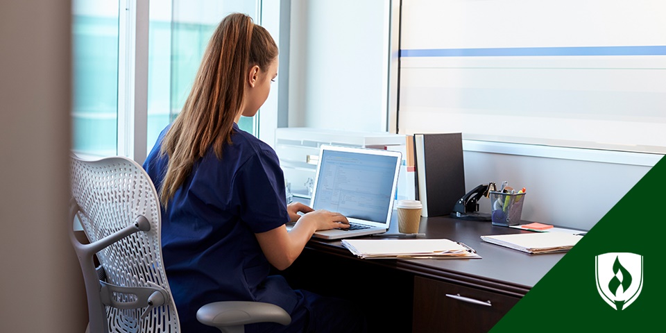 photo of a nursing informatics nurse working at a computer