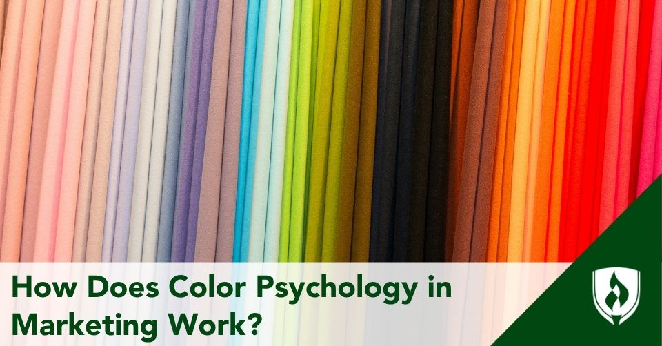 Bolts of fabric in many colors arranged in a line