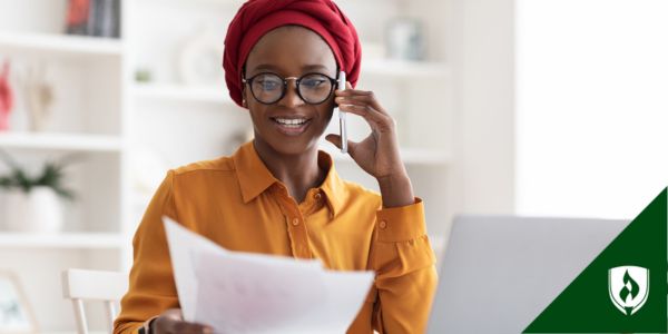 A business professional looks through a document for financial fraud