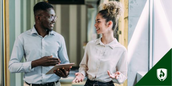 A financial accountant talks with a colleague