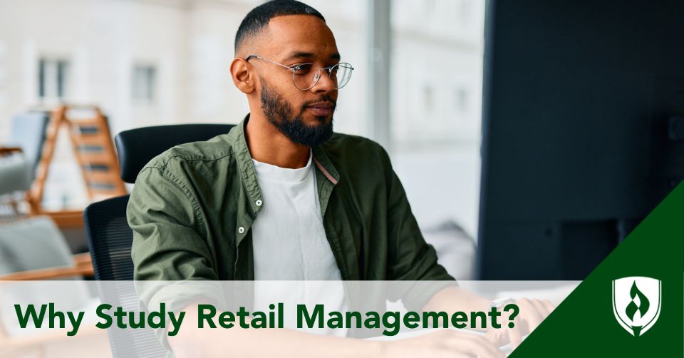 A person types on a computer looking into retail management