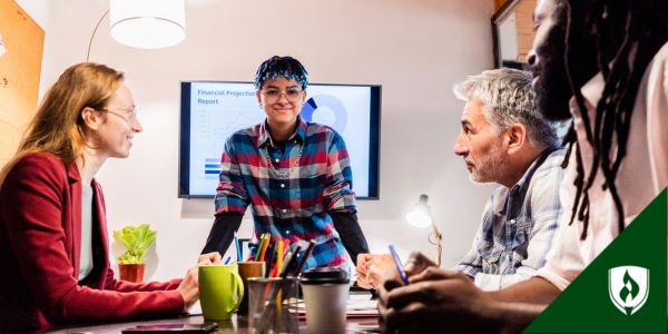 A supply chain logistician meets with their team