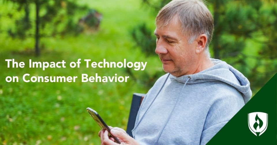 Someone sits on a park bench while shopping online