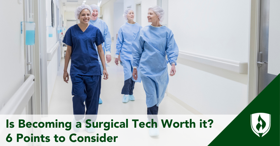Surgical techs walk down the hall of a hospital