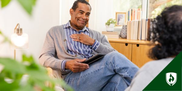 A health and wellness coach works with a patient