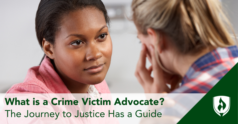 A crime victim advocate with compassionate eyes comforts a victim