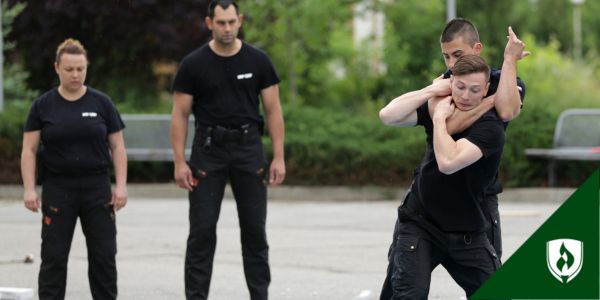 Four police officers demonstrate use of force training
