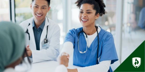 An FNP and AGNP meet with their clinical director