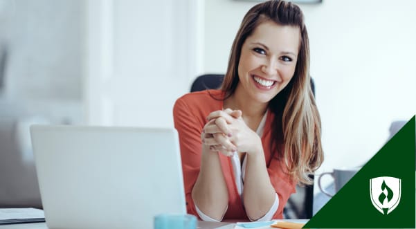 Smiling woman at desk